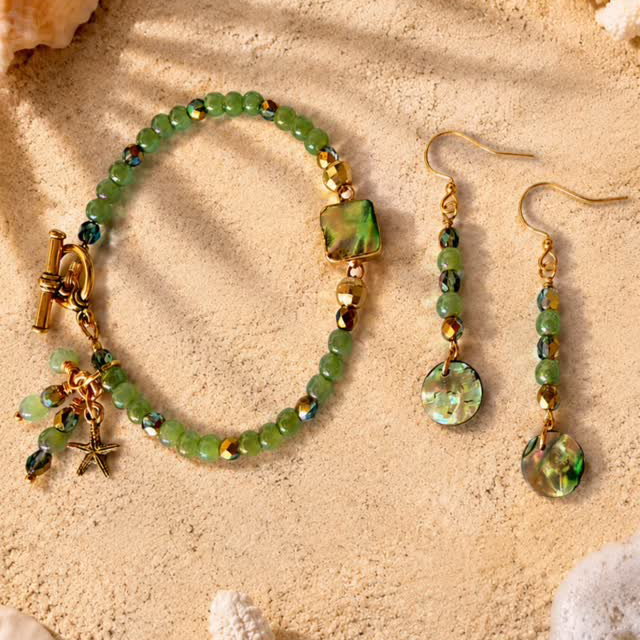‼️Bracelet SOLD‼️ ✨ NEW for Summer! ✨
Bring on the sunshine, salty breezes, and beachy vibes with this stunning 6.5” bracelet & matching earring set featuring luminous abalone, shimmering Czech glass pearls, and sparkling faceted beads. 🌊🏝️☀️

Finished with a gorgeous gold-tone TierraCast toggle clasp, whimsical sea star charm, and delicate Czech glass dangles, this set captures the magic of seaside summers in every detail. Perfect for vacations, coastal evenings, or adding a touch of ocean-inspired sparkle to your everyday look! 💚🩵💙💛 ✨ DM for the deets! ✨